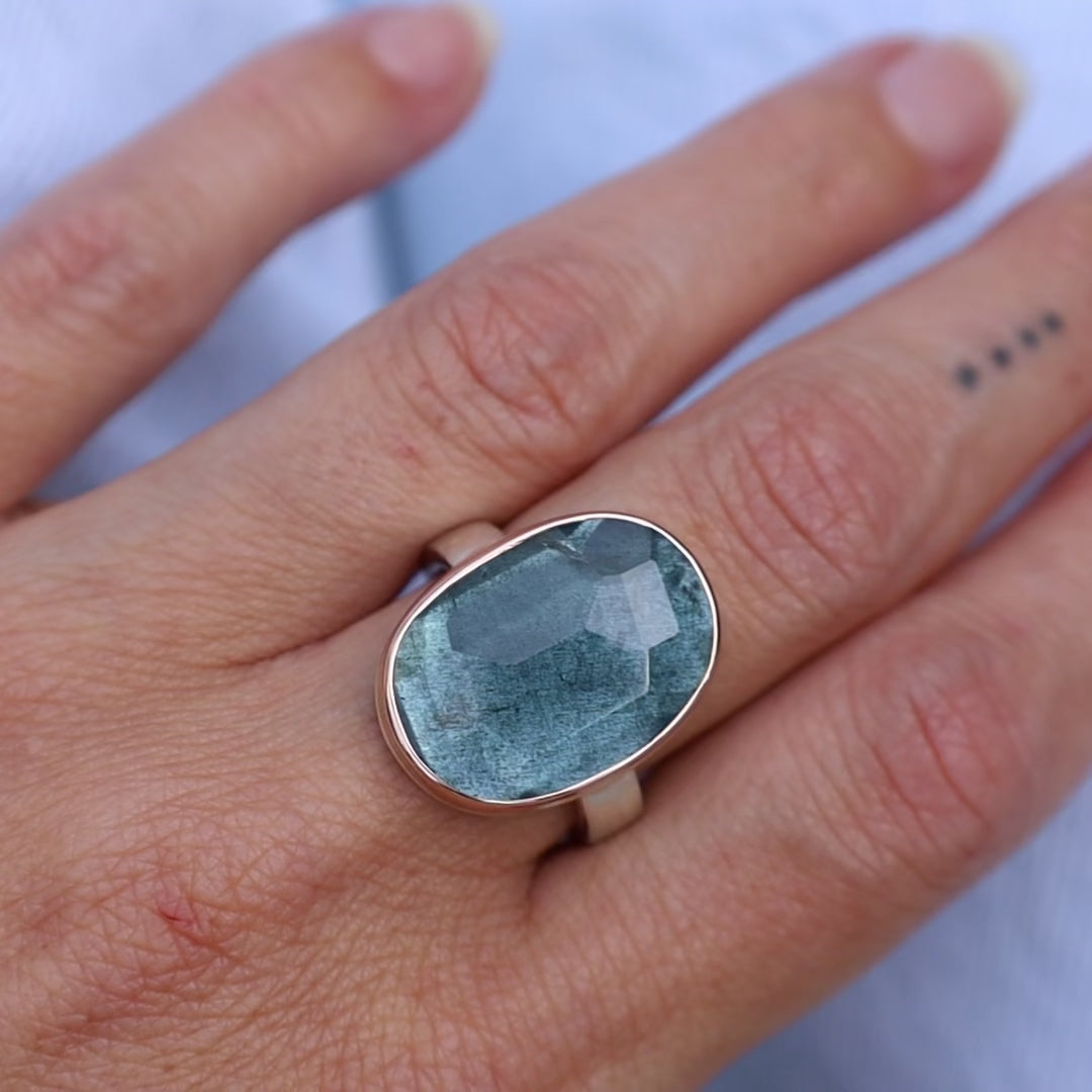 Load and play video in Gallery viewer, Sterling &amp;amp; 14K Rose Gold Ring with Vertical Oval Faceted Moss Aquamarine
