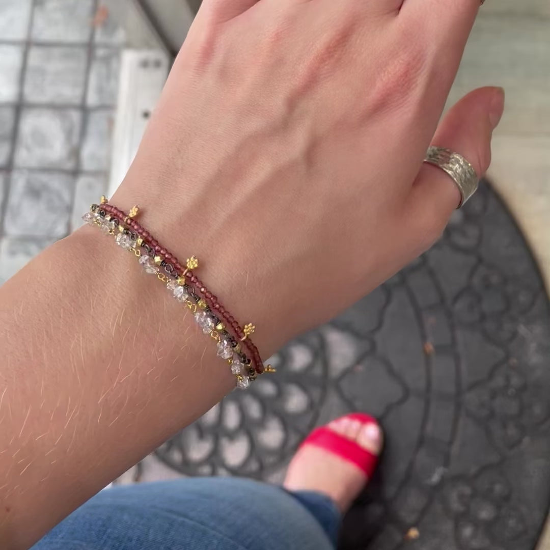 Faceted Garnets with Gold Charms Bracelet