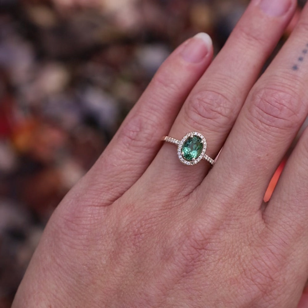 
                  
                    Load and play video in Gallery viewer, Oval Green Tourmaline with White Diamond Halo Ring
                  
                