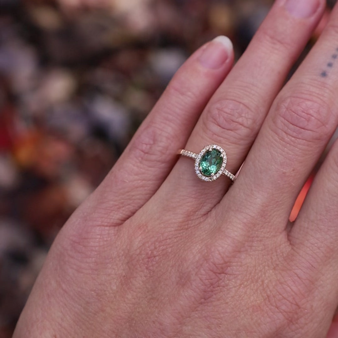 Load and play video in Gallery viewer, Oval Green Tourmaline with White Diamond Halo Ring
