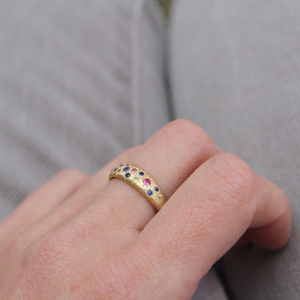 
                      
                        RING-18K Tapered Multi Sapphire Band
                      
                    