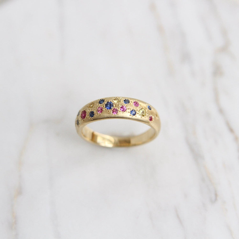 
                      
                        RING-18K Tapered Multi Sapphire Band
                      
                    