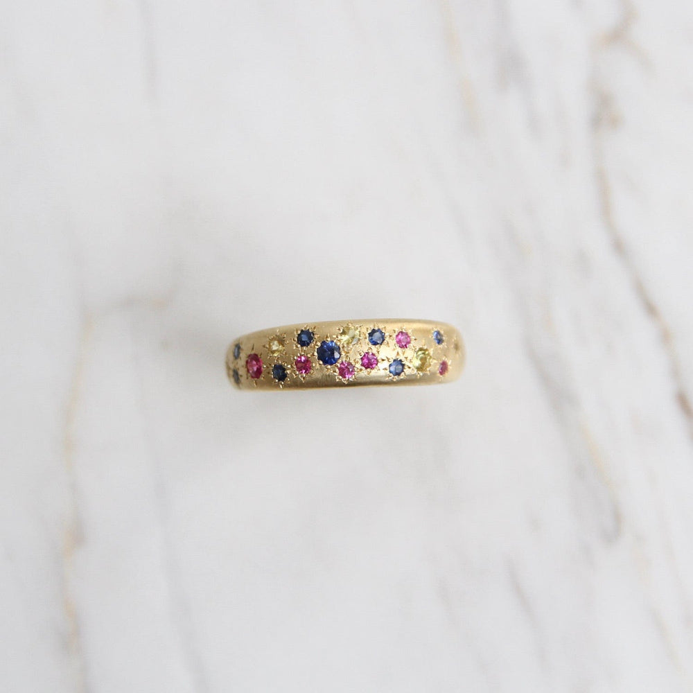 
                      
                        RING-18K Tapered Multi Sapphire Band
                      
                    