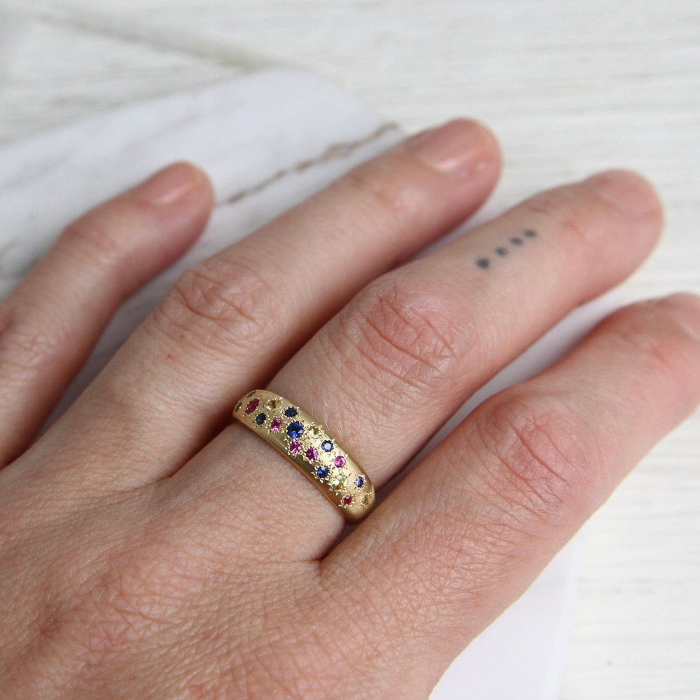 
                      
                        RING-18K Tapered Multi Sapphire Band
                      
                    