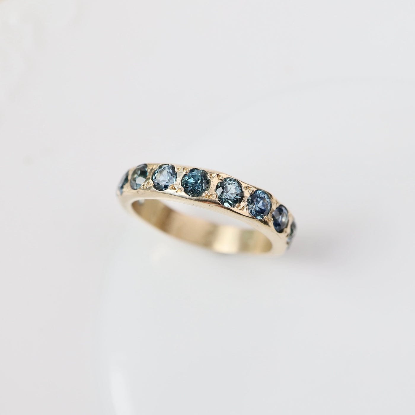RNG-14K 11 Stone Montana Sapphire Band Size 7
