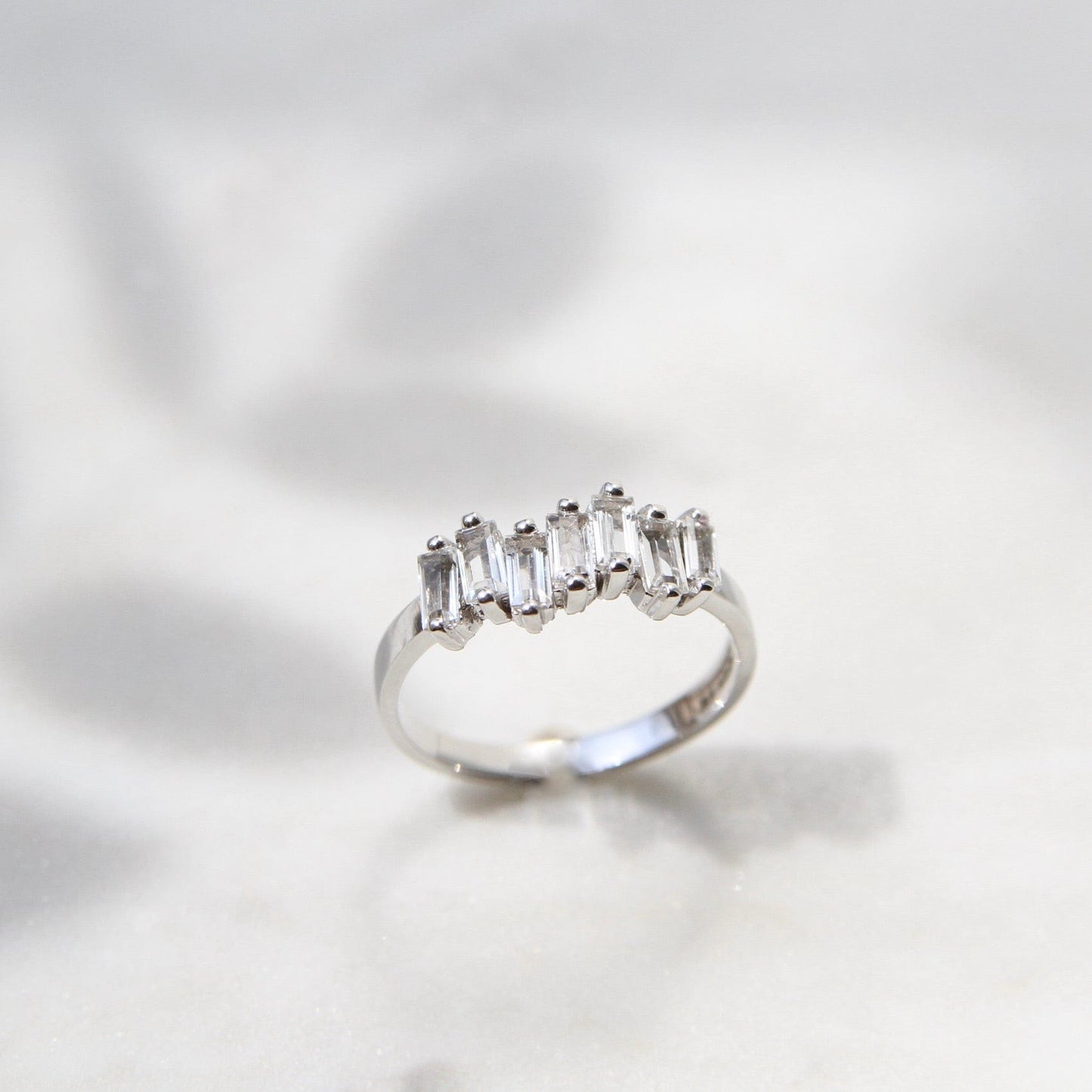 RNG-14K 14k White Gold White Topaz Baguette Ring