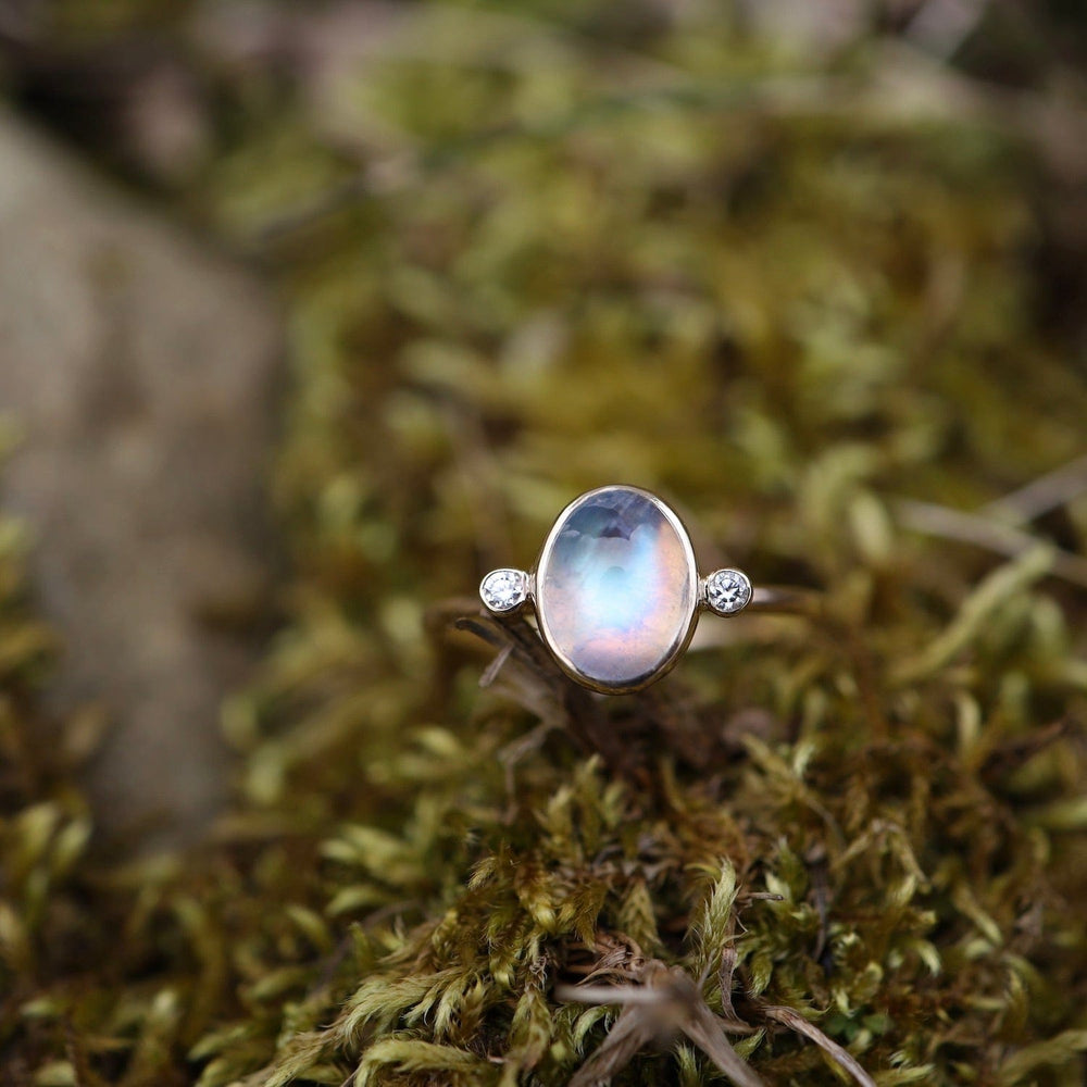 
                      
                        RNG-14K Astral Ring with Moonstone & Diamonds
                      
                    