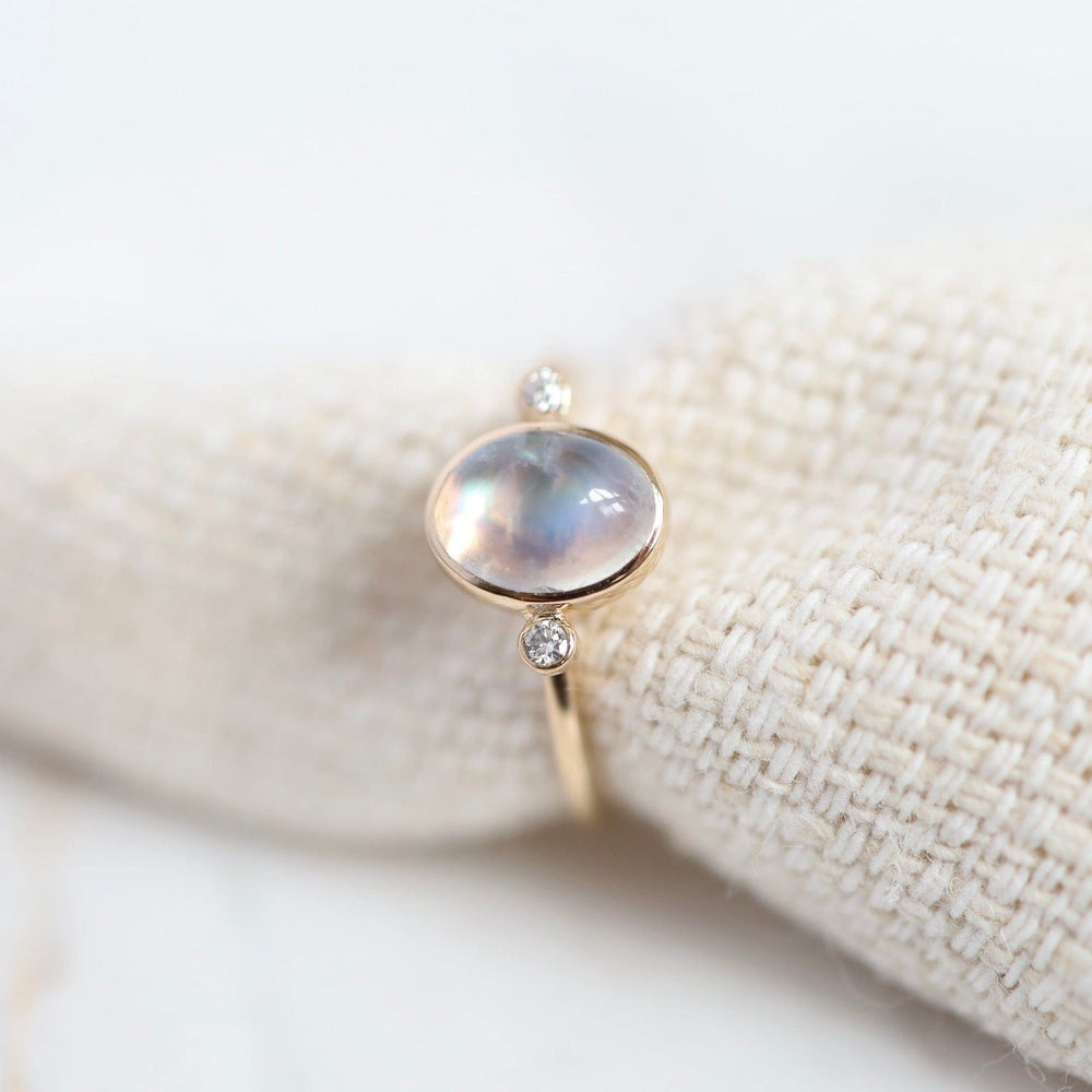 
                      
                        RNG-14K Astral Ring with Moonstone & Diamonds
                      
                    