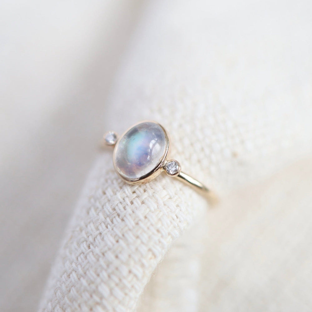 
                      
                        RNG-14K Astral Ring with Moonstone & Diamonds
                      
                    