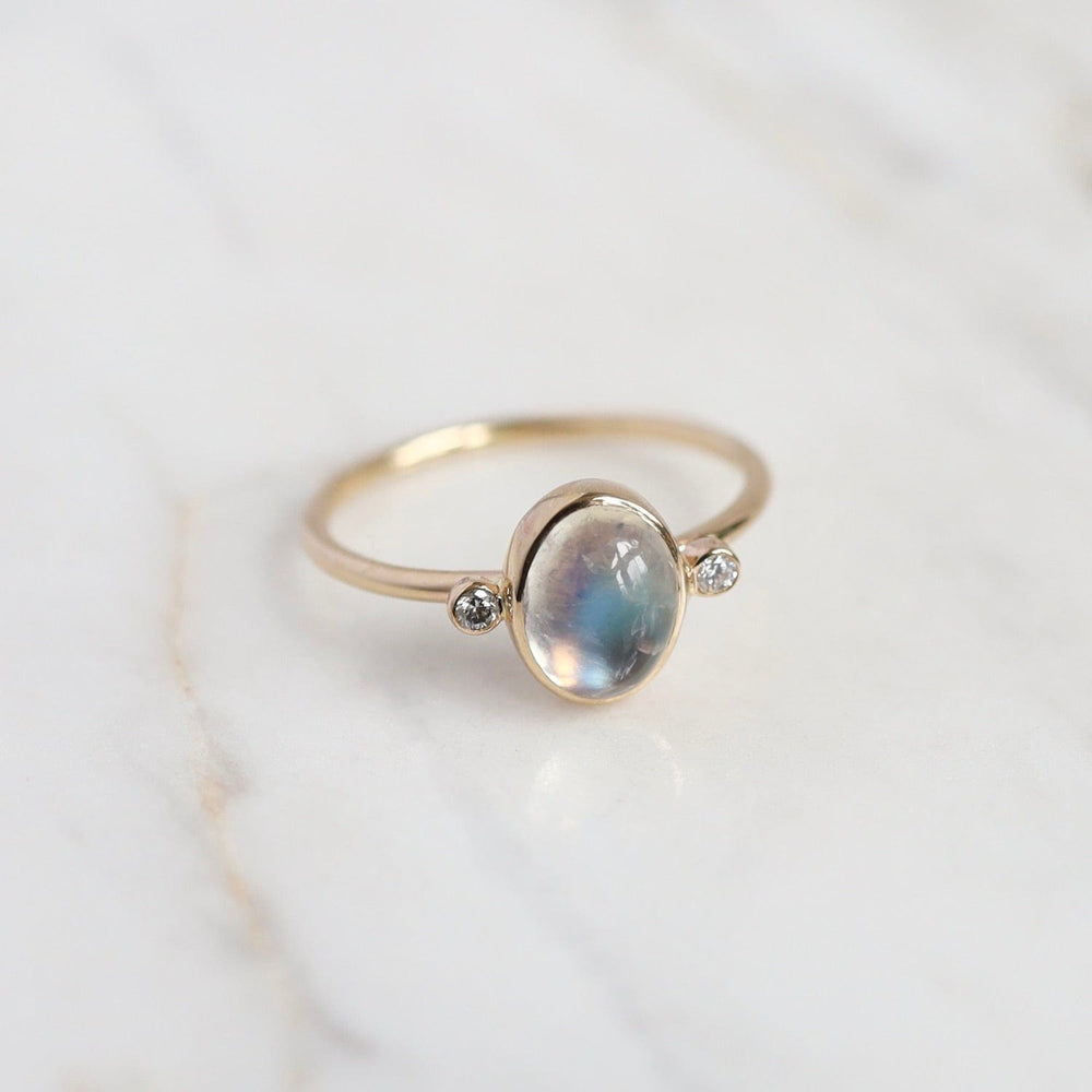 
                      
                        RNG-14K Astral Ring with Moonstone & Diamonds
                      
                    