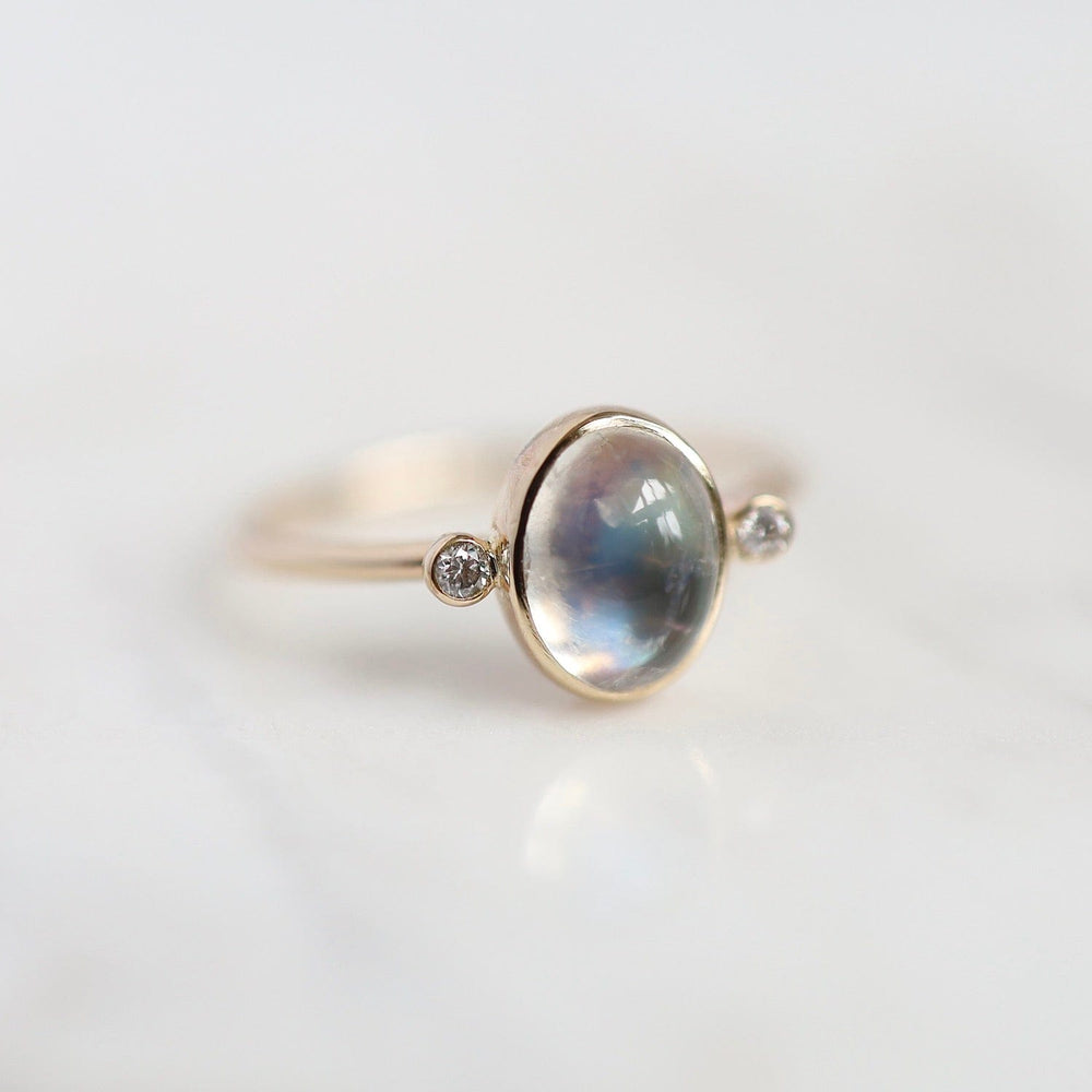 
                      
                        RNG-14K Astral Ring with Moonstone & Diamonds
                      
                    