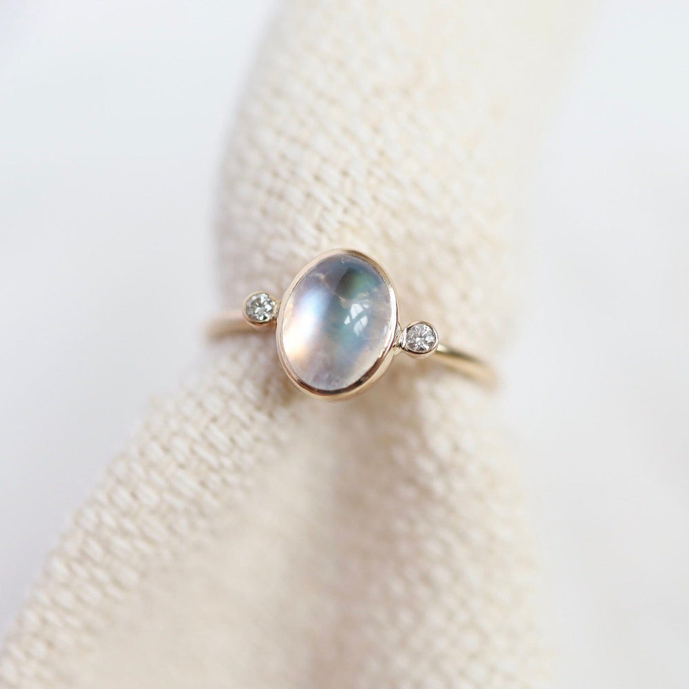 
                      
                        RNG-14K Astral Ring with Moonstone & Diamonds
                      
                    