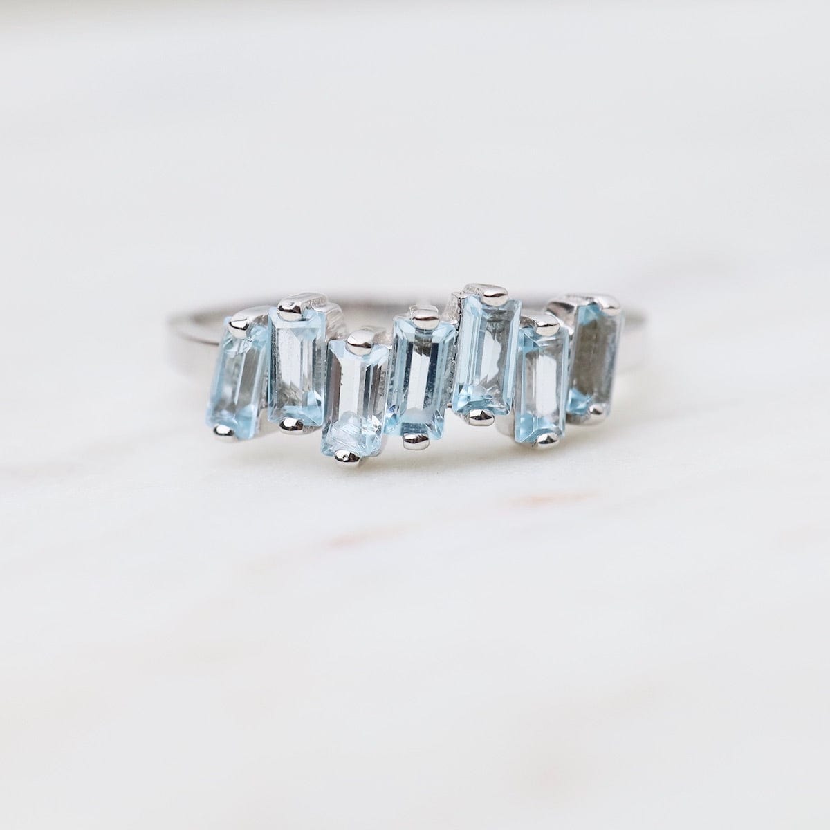 RNG-14K Blue Topaz Half Band Ring