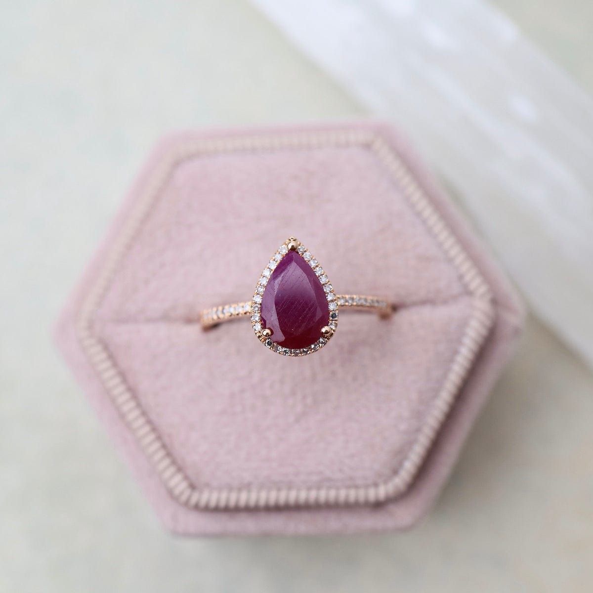 RNG-14K Drop Shape Ruby with White Diamond Halo & Shoulders Ring