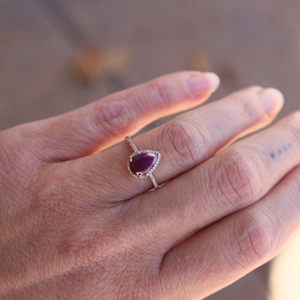 
                      
                        RNG-14K Drop Shape Ruby with White Diamond Halo & Shoulders Ring
                      
                    