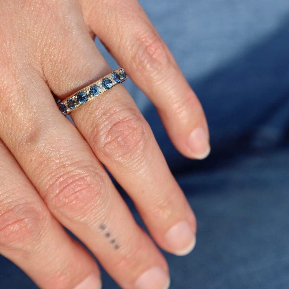 
                  
                    RNG-14K Eleven Stone Montana Sapphire Band Ring
                  
                