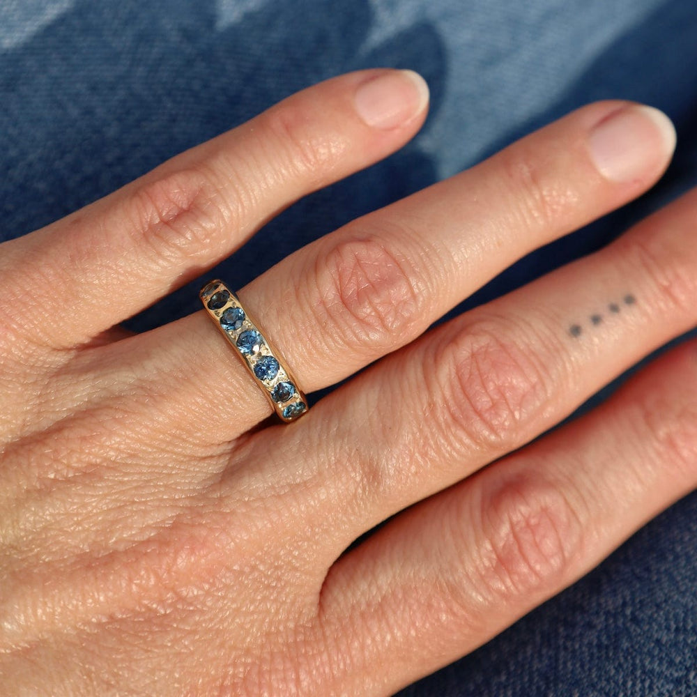 
                  
                    RNG-14K Eleven Stone Montana Sapphire Band Ring
                  
                