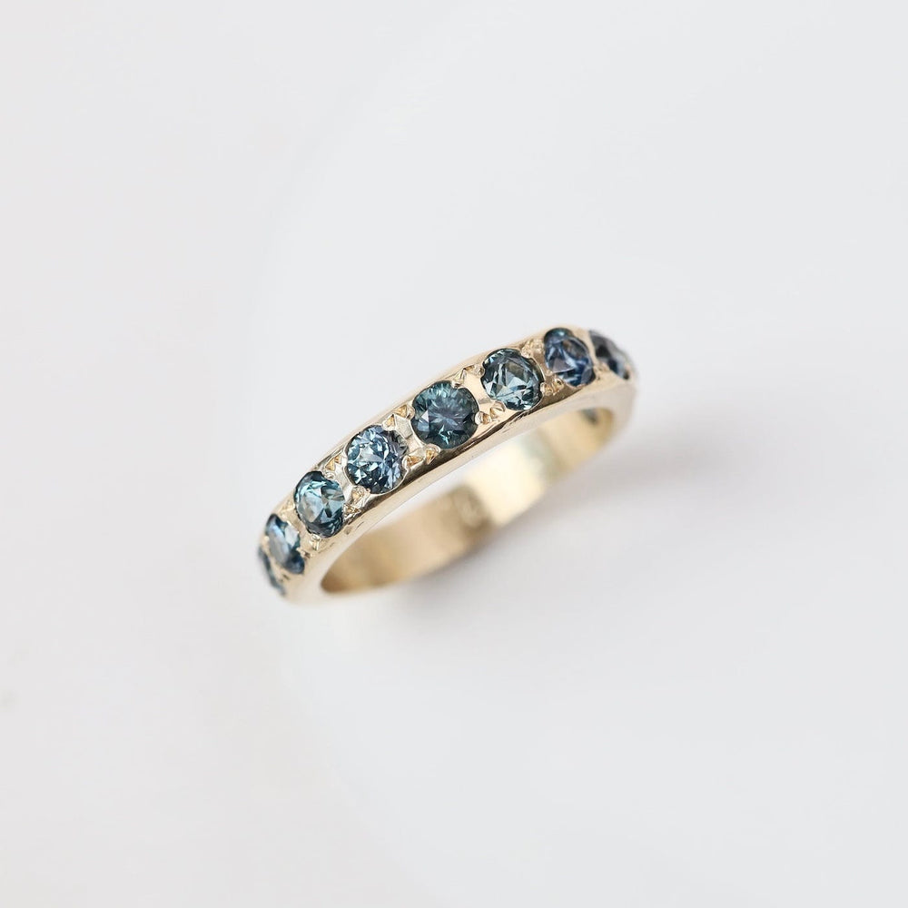 
                  
                    RNG-14K Eleven Stone Montana Sapphire Band Ring
                  
                