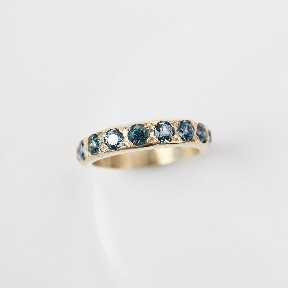 
                  
                    RNG-14K Eleven Stone Montana Sapphire Band Ring
                  
                
