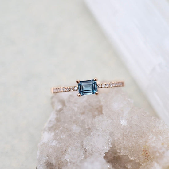 RNG-14K Emerald Cut London Blue Topaz with White Diamond Shoulders Ring