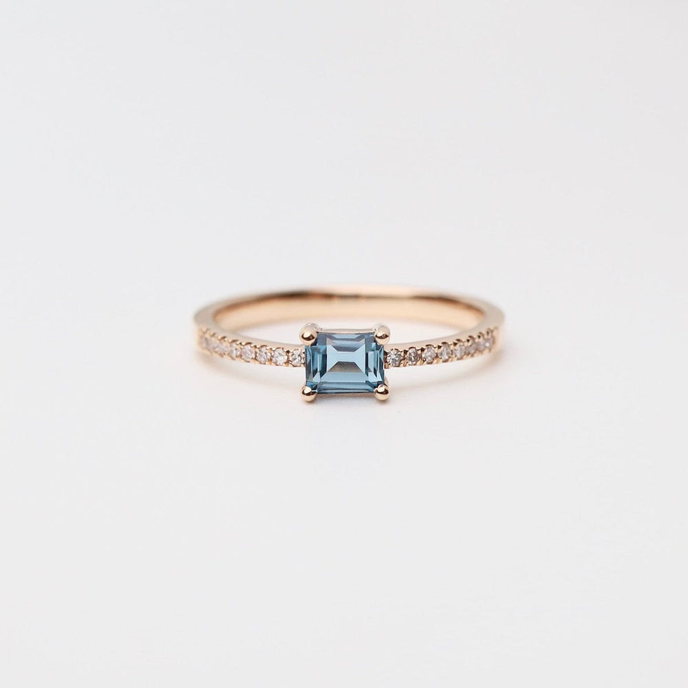 
                      
                        RNG-14K Emerald Cut London Blue Topaz with White Diamond Shoulders Ring
                      
                    