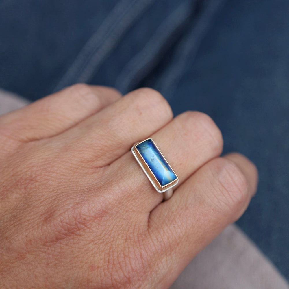 
                      
                        RNG-14K Jamie Joseph Extra Small Rectangular Inverted Blue Rainbow Moonstone Ring
                      
                    