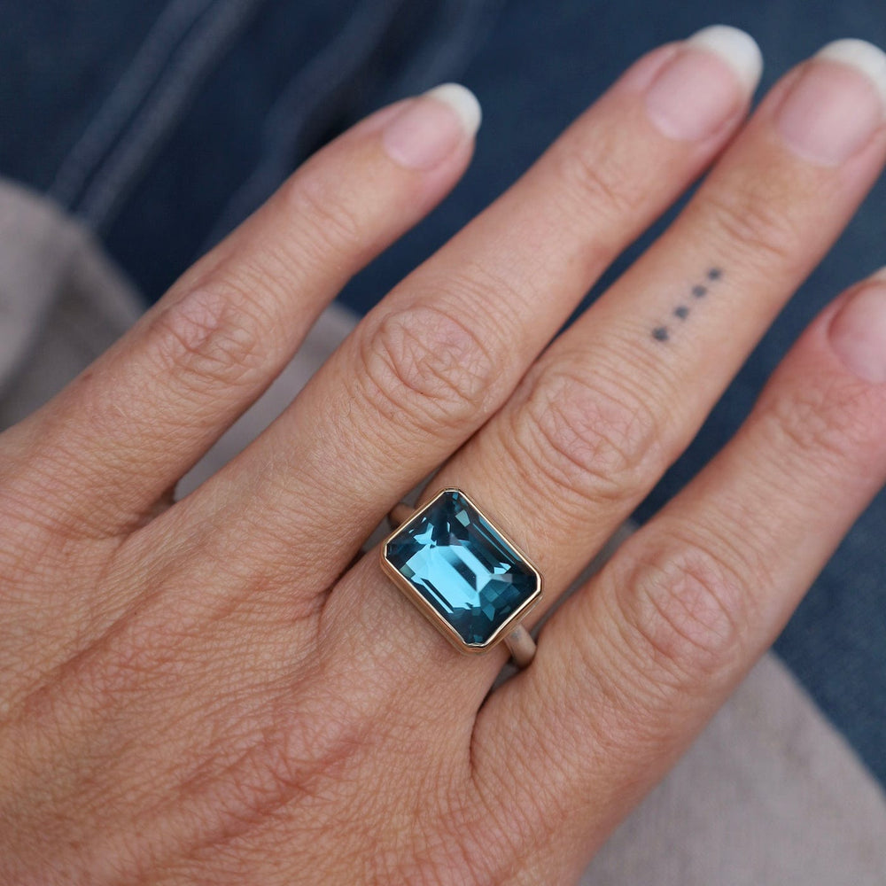 
                      
                        RNG-14K Jamie Joseph Small Rectangular Inverted London Blue Topaz Ring
                      
                    