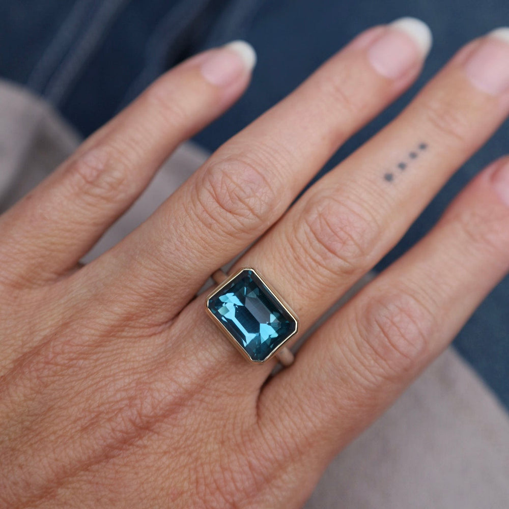 
                      
                        RNG-14K Jamie Joseph Small Rectangular Inverted London Blue Topaz Ring
                      
                    