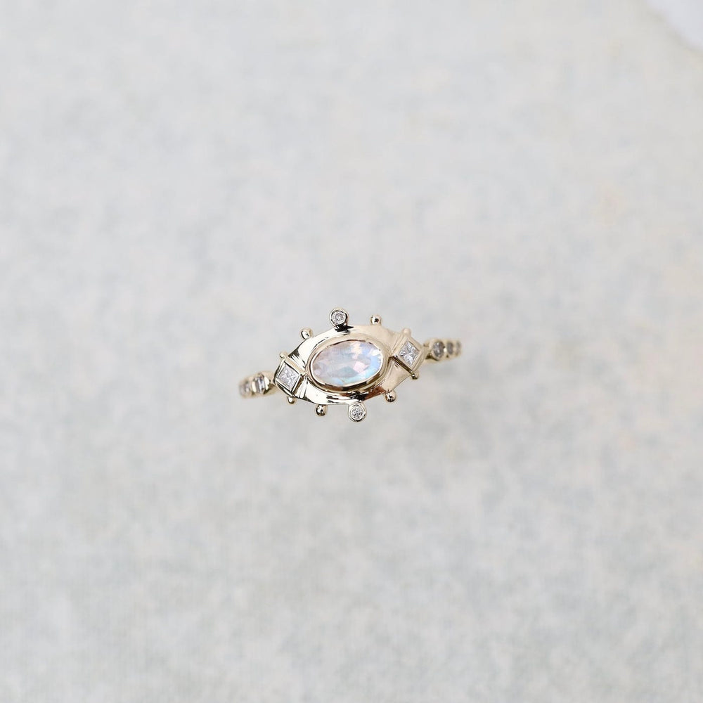 
                      
                        RNG-14K Moonstone & Diamonds Eye Ring
                      
                    