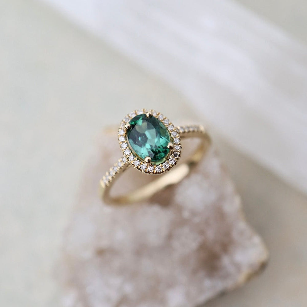 
                      
                        RNG-14K Oval Green Tourmaline with White Diamond Halo Ring
                      
                    