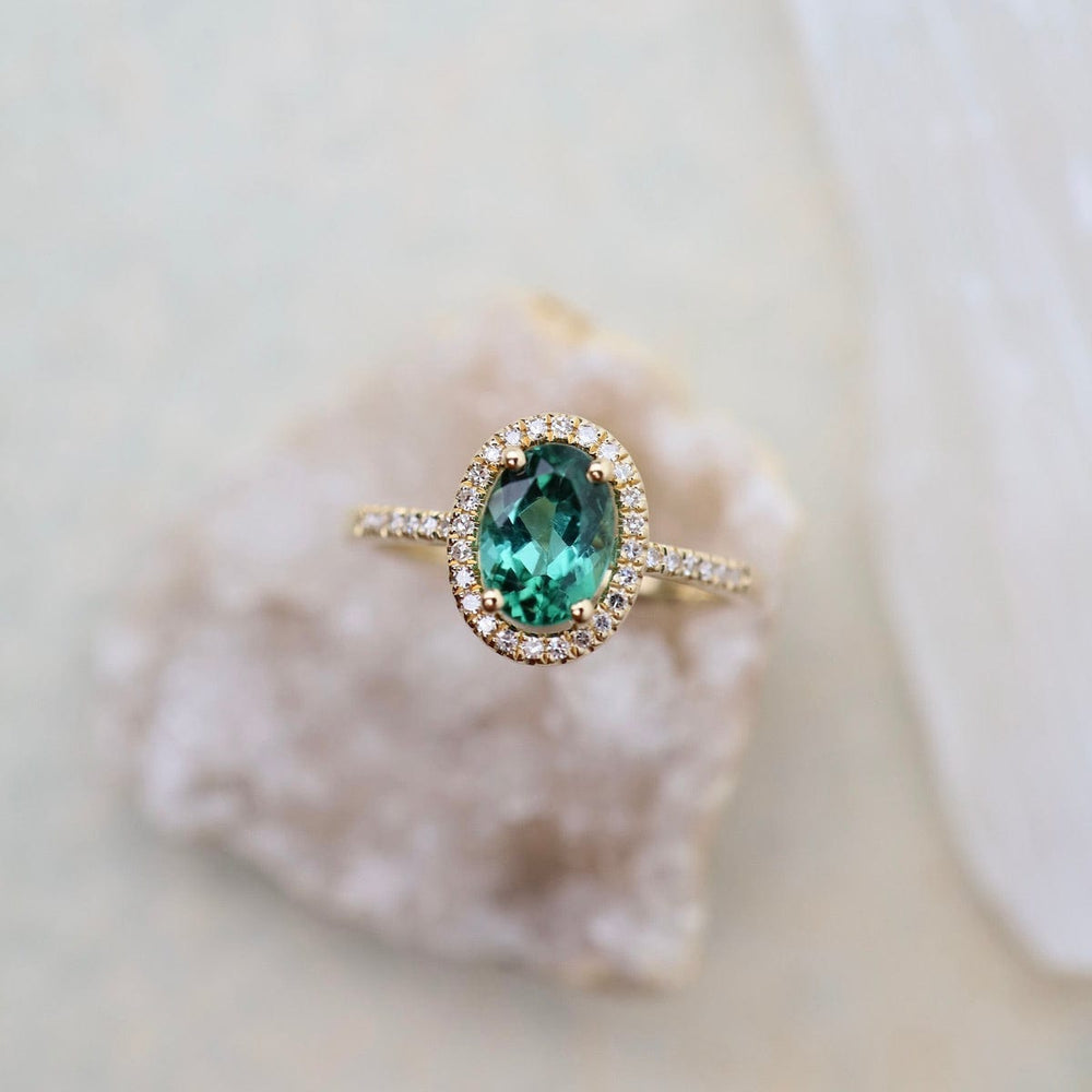 
                      
                        RNG-14K Oval Green Tourmaline with White Diamond Halo Ring
                      
                    