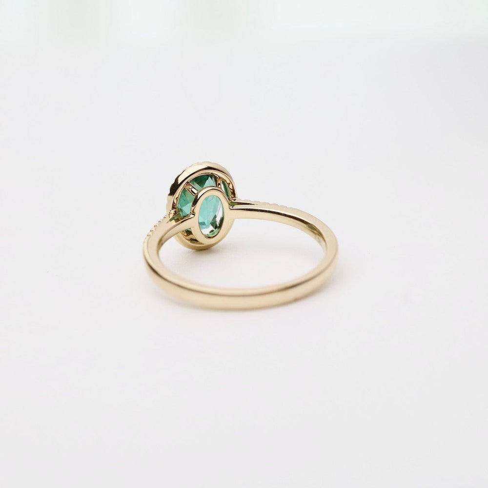 
                      
                        RNG-14K Oval Green Tourmaline with White Diamond Halo Ring
                      
                    