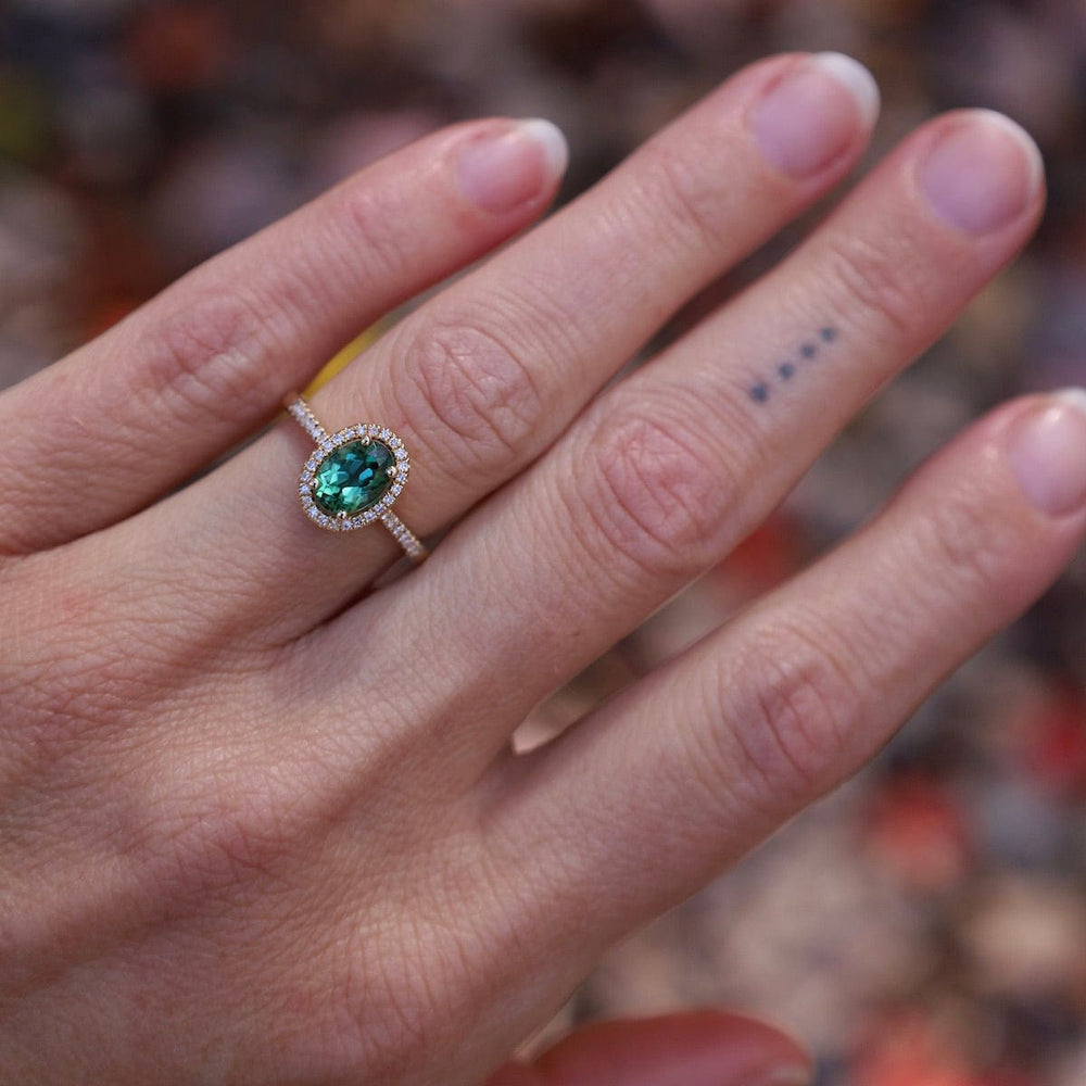 
                      
                        RNG-14K Oval Green Tourmaline with White Diamond Halo Ring
                      
                    