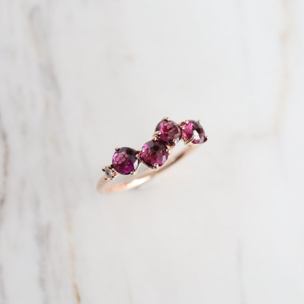 
                  
                    RNG-14K Rose Gold 4mm Round Rhodolite Ring
                  
                