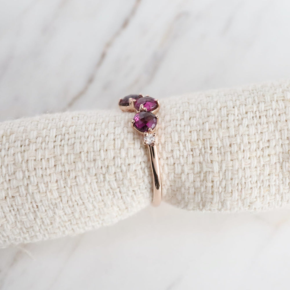 
                  
                    RNG-14K Rose Gold 4mm Round Rhodolite Ring
                  
                