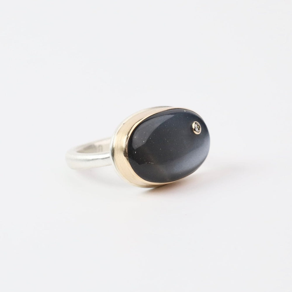 
                  
                    RNG-14K Sterling & 14K Gold Ring w/ Oval Smooth GREY MOONS
                  
                