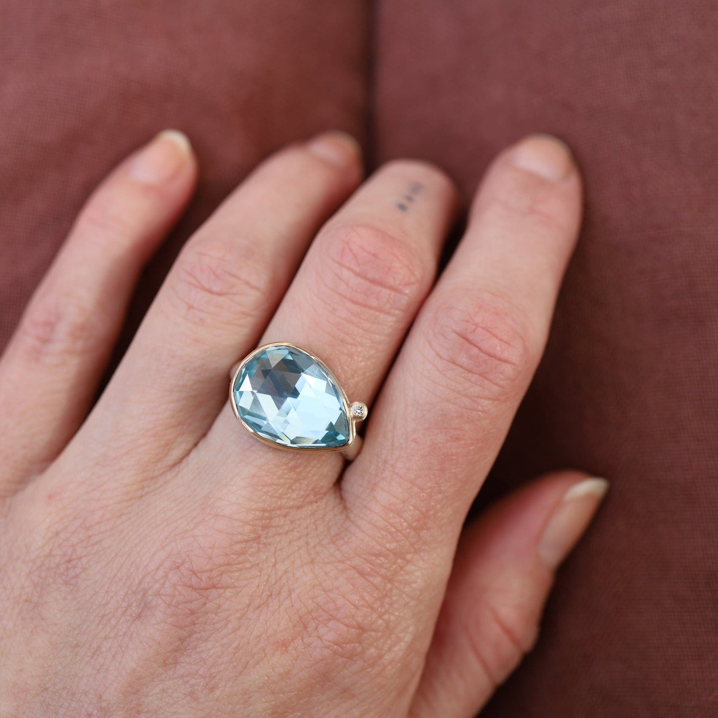 Teardrop blue topaz on sale ring