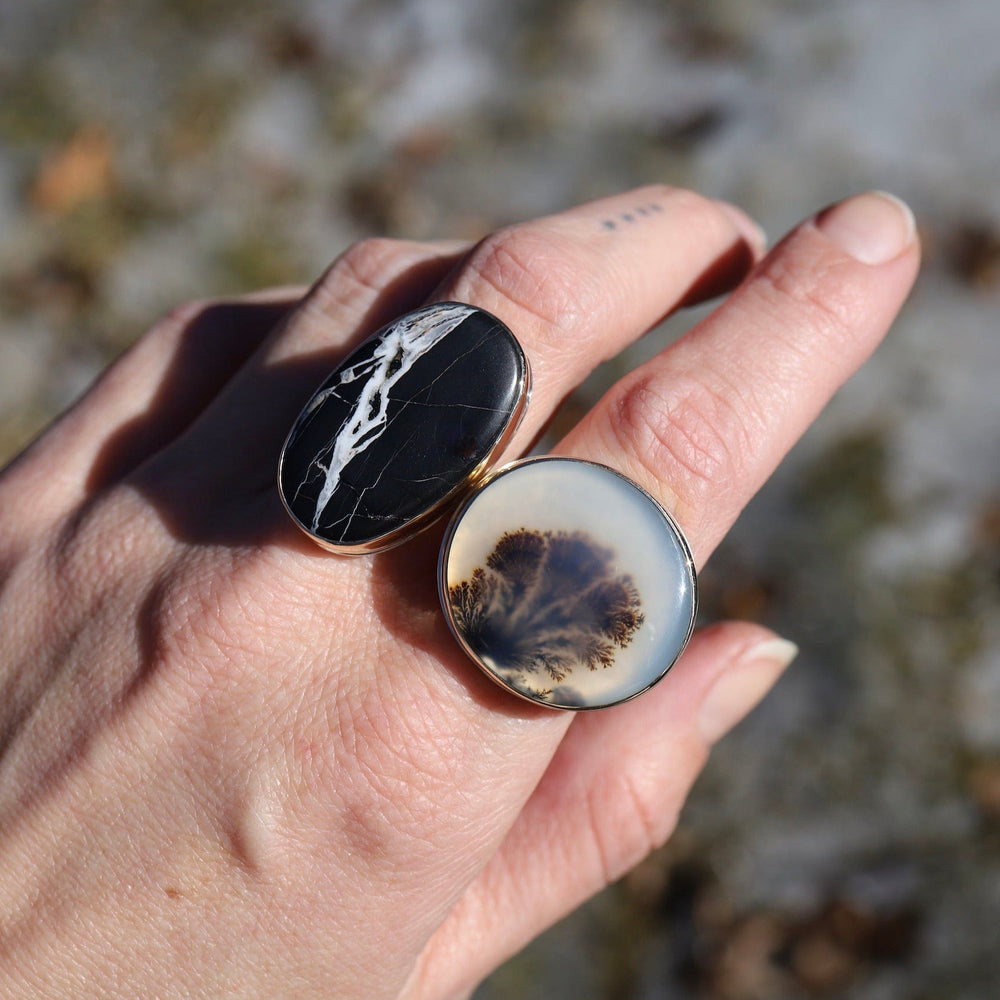 
                      
                        RNG-14K Sterling & 14K Gold Ring with Vertical Oval White Buffalo Turquoise
                      
                    