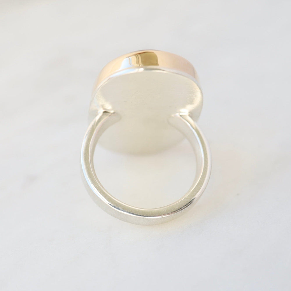 
                      
                        RNG-14K Sterling & 14K Gold Ring with Vertical Oval White Buffalo Turquoise
                      
                    