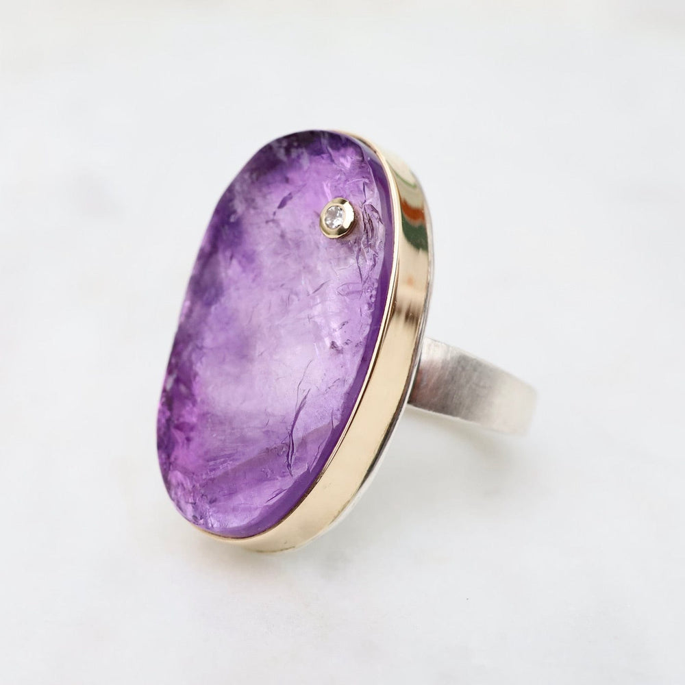 
                      
                        RNG-14K Sterling & 14K Gold Ring wtih Vertical Oval Surface Cut Amethyst & Diamond
                      
                    