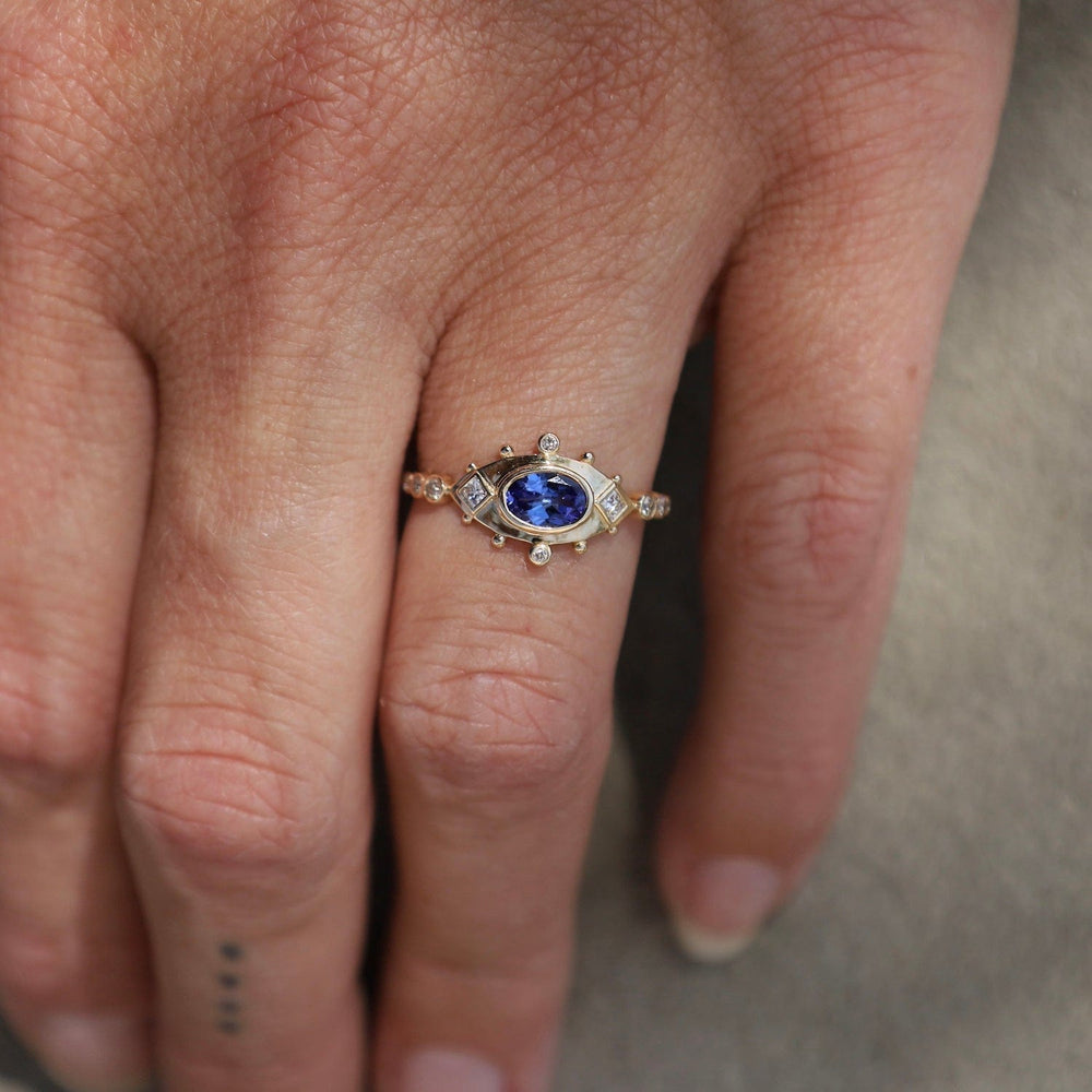 
                      
                        RNG-14K Tanzanite & Diamonds Eye Ring
                      
                    