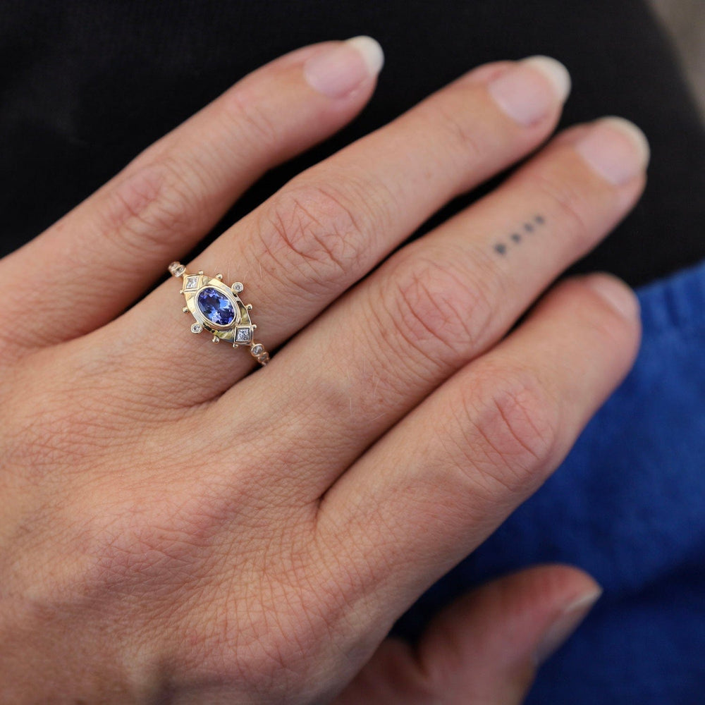 
                      
                        RNG-14K Tanzanite & Diamonds Eye Ring
                      
                    