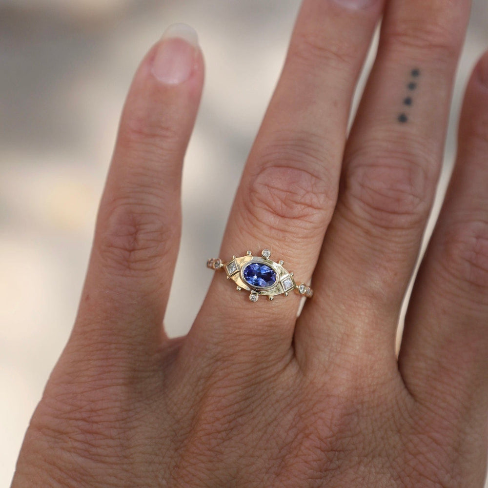 
                      
                        RNG-14K Tanzanite & Diamonds Eye Ring
                      
                    