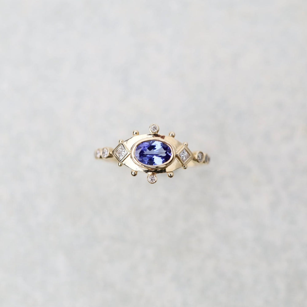 
                      
                        RNG-14K Tanzanite & Diamonds Eye Ring
                      
                    