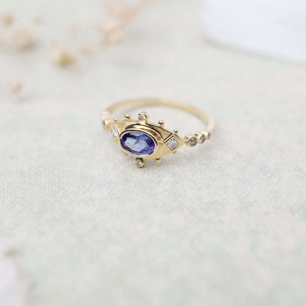 
                      
                        RNG-14K Tanzanite & Diamonds Eye Ring
                      
                    