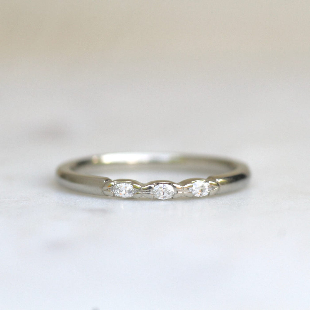 
                      
                        RNG-14K Three Marquise Diamond Band
                      
                    