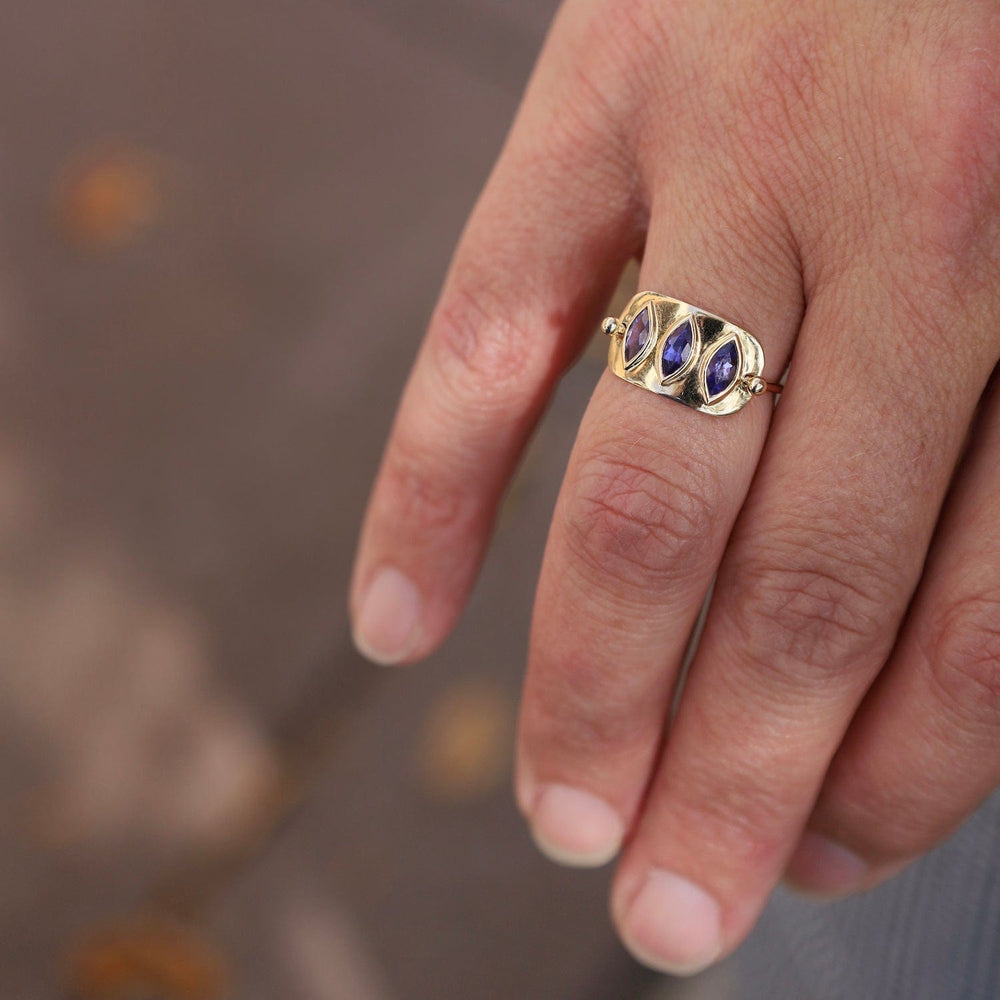 
                  
                    RNG-14K Triple Marquise Tanzanite Solid Gold Plate Ring
                  
                