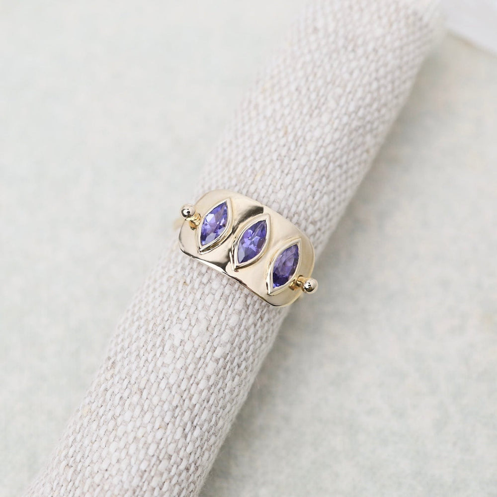 
                      
                        RNG-14K Triple Marquise Tanzanite Solid Gold Plate Ring
                      
                    