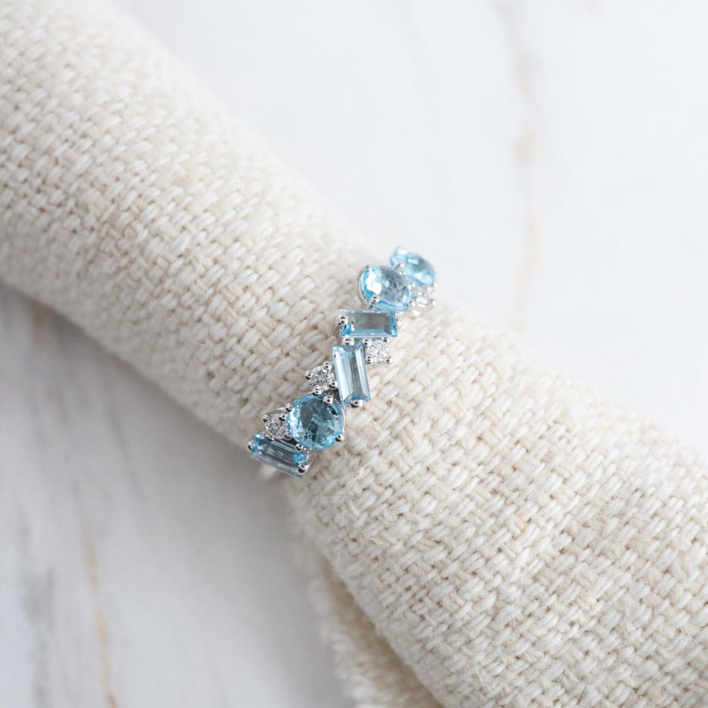 
                  
                    RNG-14K White Gold Mixed Cut Blue Topaz Ring
                  
                