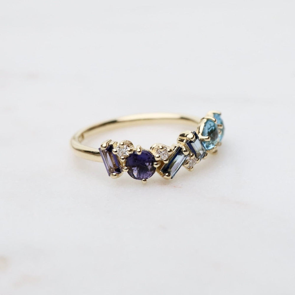 
                      
                        RNG-14K Yellow Gold Mixed Cut Blue Topaz Ring
                      
                    